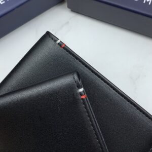 محفظة وكراتة وميدالية Tommy